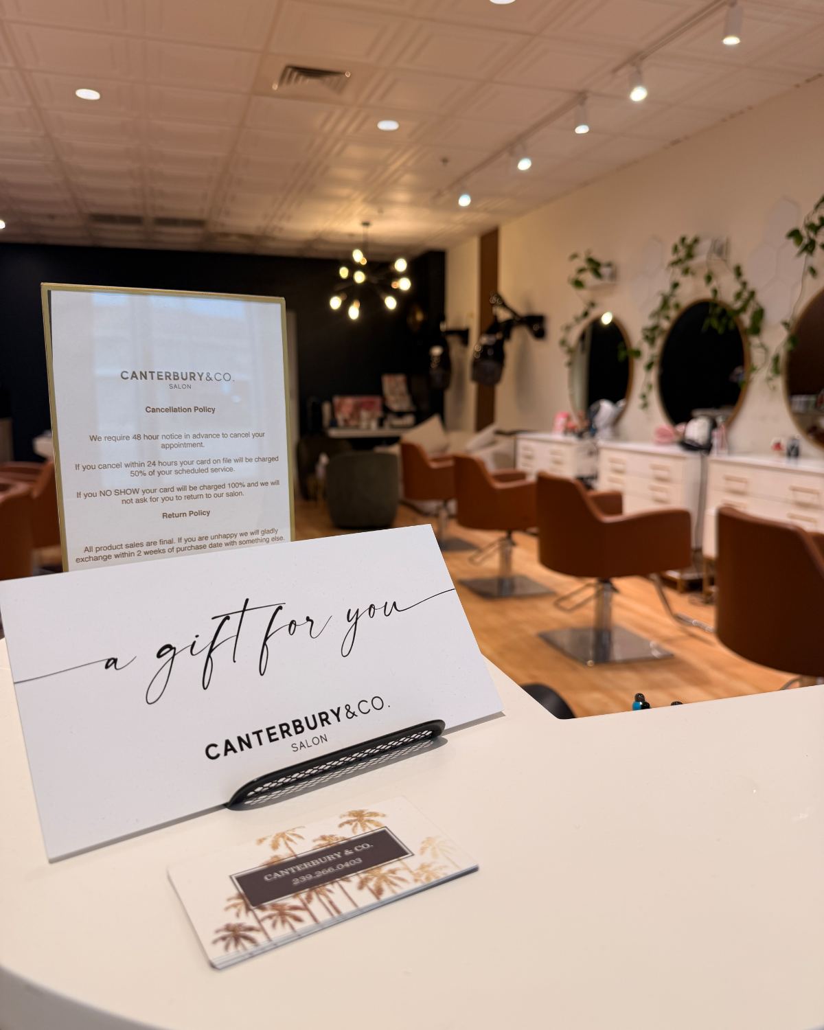 Canterbury & Co. gift cards on the reception desk