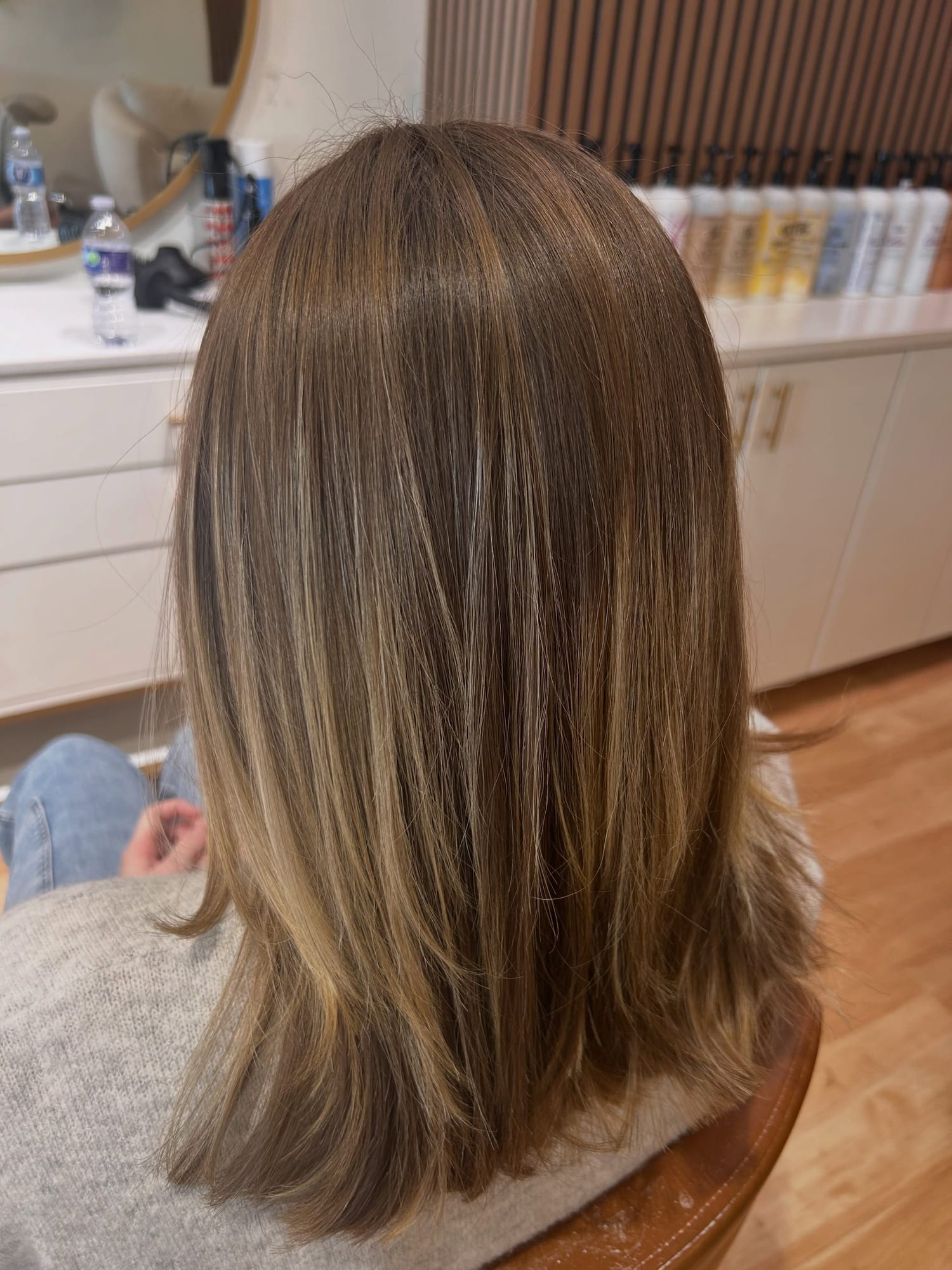 After balayage: the same hair with soft, sun-kissed dimension and no visible line